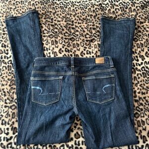 American Eagle Outfitters Dark Blue Boot Cut Jeans with blue glitter on the back